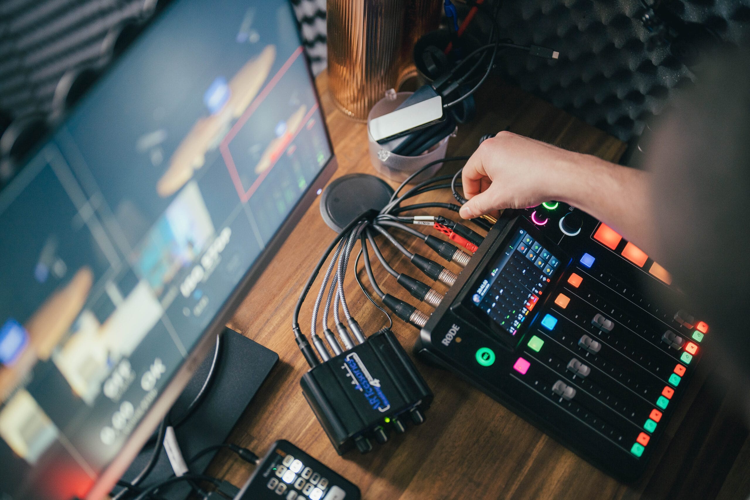 The producer monitors audio, video and lighting from the desk.