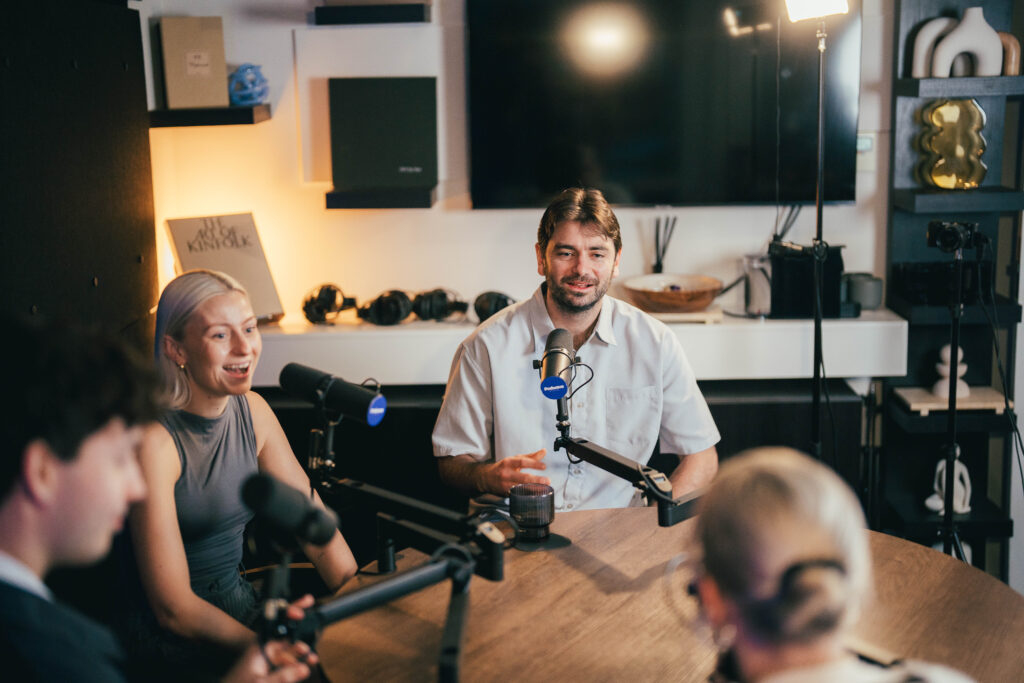 Jon and Blaise in conversation at microphones during a podcast recording at Podwave Studios West Perth